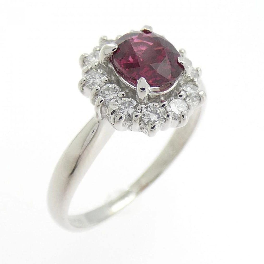 PT850 RUBY RING: PT850 Ruby Ring Brand: Unbranded Type/Style: Ruby Ring Material: Platinum850, Main Stone/Creation RubySecondary Stone Diamond Color: Platinum Size: US 5 3/4 Accessories: None Accessories Notice: When