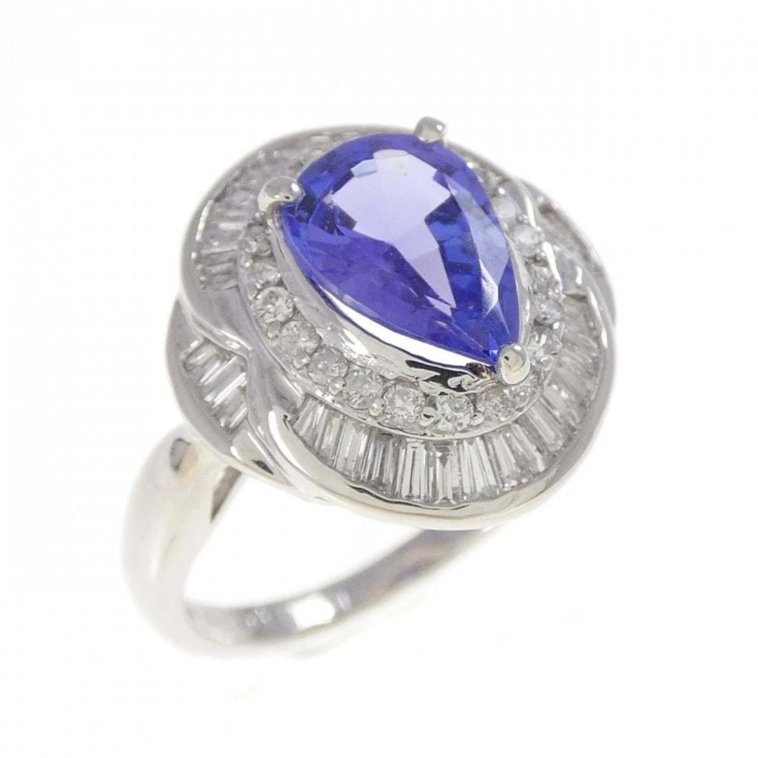 PT900 TANZANITE RING: PT900 Tanzanite Ring Brand: Unbranded Type/Style: Tanzanite Ring Material: Platinum900, Main Stone/Creation Tanzanite Secondary Stone Diamond Color: Platinum Size: US 5 1/4 Accessories: None