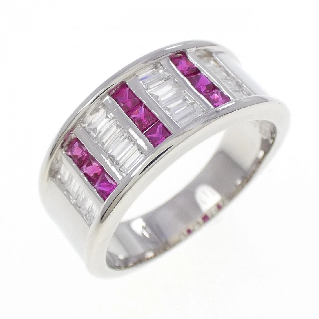 PT900 RUBY RING: PT900 Ruby Ring Brand: Unbranded Type/Style: Ruby Ring Material: Platinum900, Main Stone/Creation RubySecondary Stone Diamond Color: Platinum Size: US 7 Accessories: None Accessories Notice: When