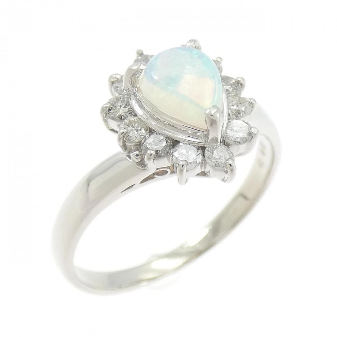 PT900 OPAL RING: PT900 Opal Ring Brand: Unbranded Type/Style: Opal Ring Material: Platinum900, Main Stone/Creation Opal Secondary Stone Diamond Color: Platinum Size: US 7 1/4 Accessories: None Accessories Notice: