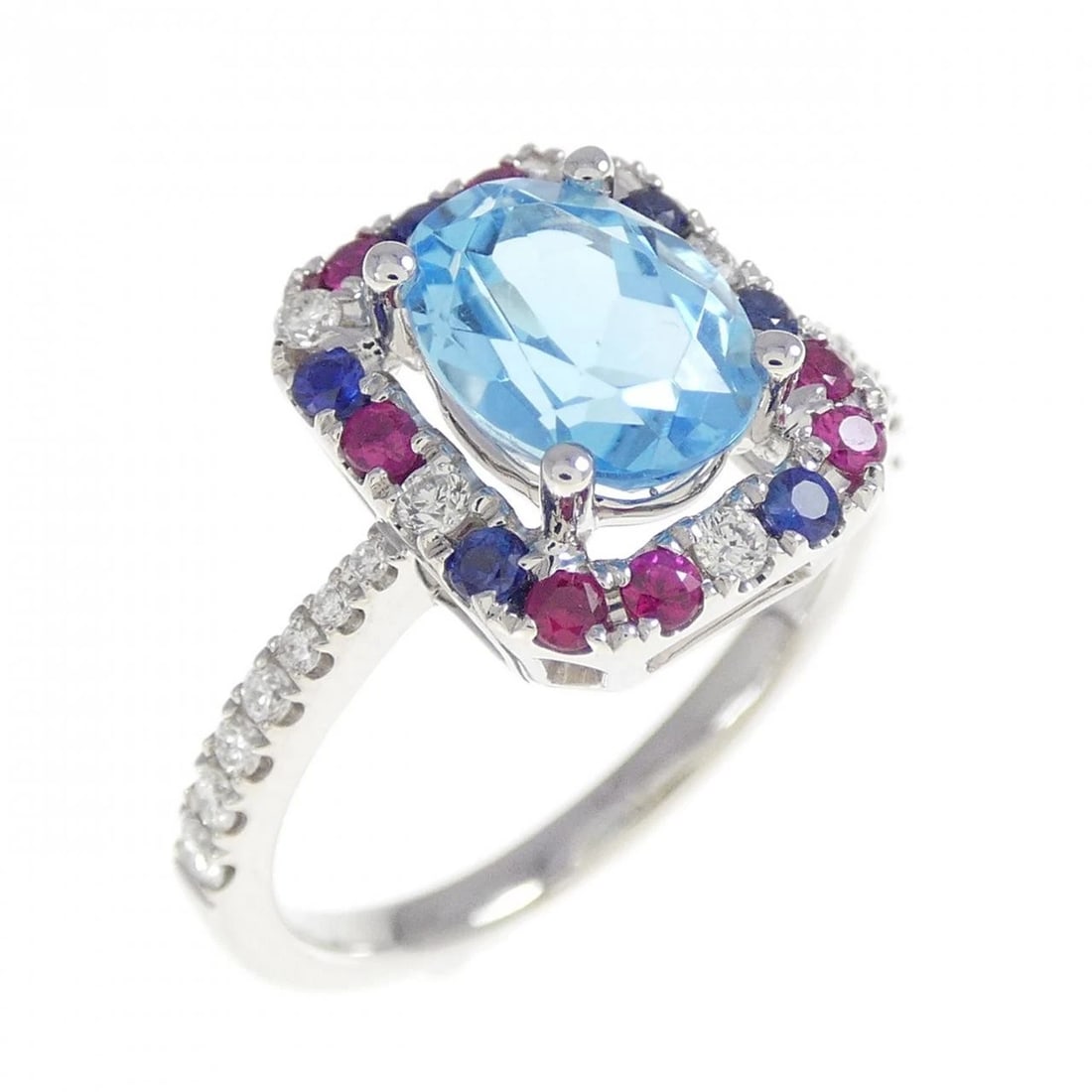 750WG BLUE TOPAZ RING: 750WG Blue Topaz Ring Brand: Unbranded Type/Style: Blue Topaz ring Material: 750 White Gold, Main Stone/Creation Blue Topaz Secondary Stone Ruby/Sapphire/Diamond Color: White Gold Size: US 5 1/4