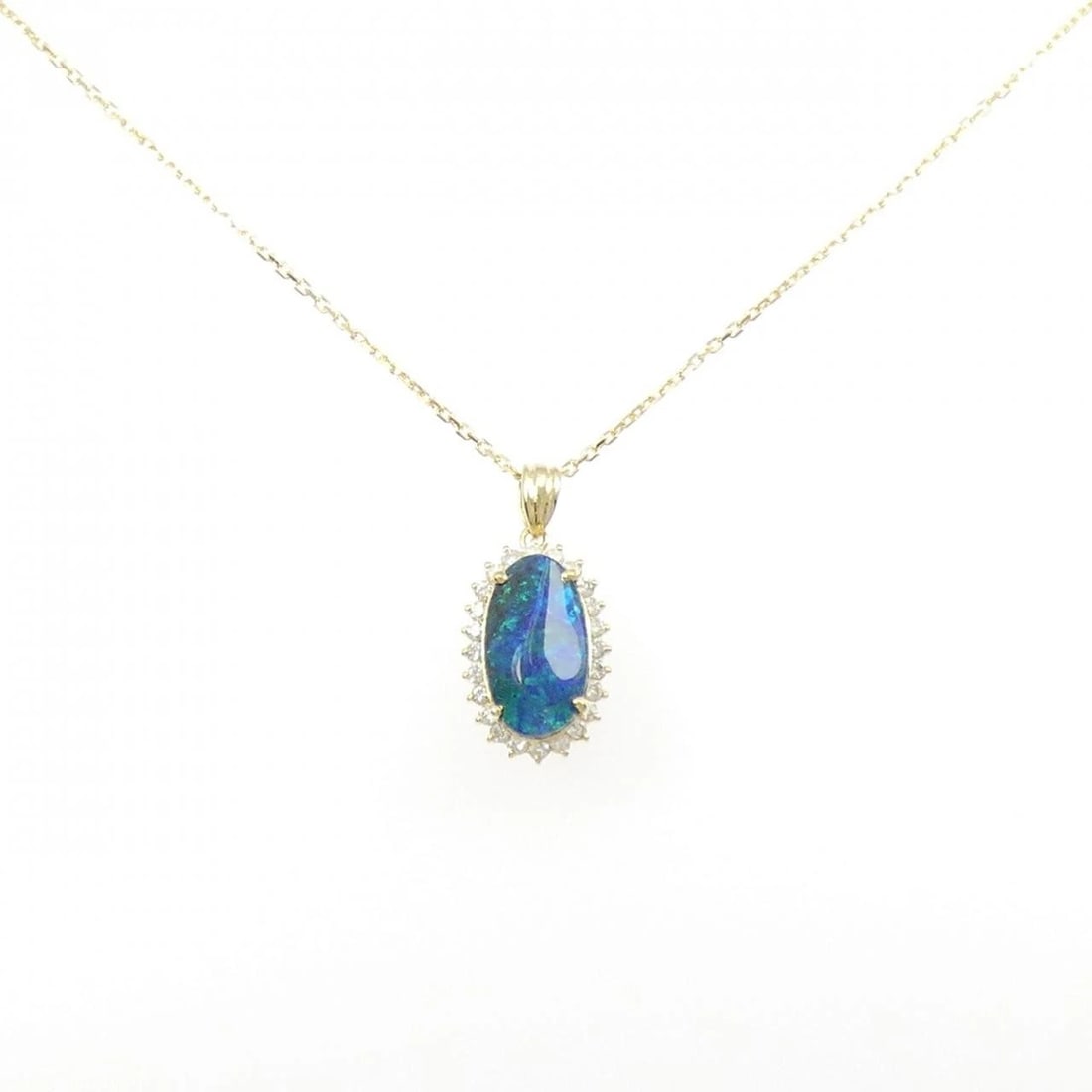 K18YG BOULDER OPAL NECKLACE: K18YG Boulder Opal Necklace Brand: Unbranded Type/Style: Boulder Opal Necklace Material: 18K Yellow Gold, Main Stone/Creation Boulder Opal Secondary Stone Diamond Color: Yellow Gold Size: Actual Size