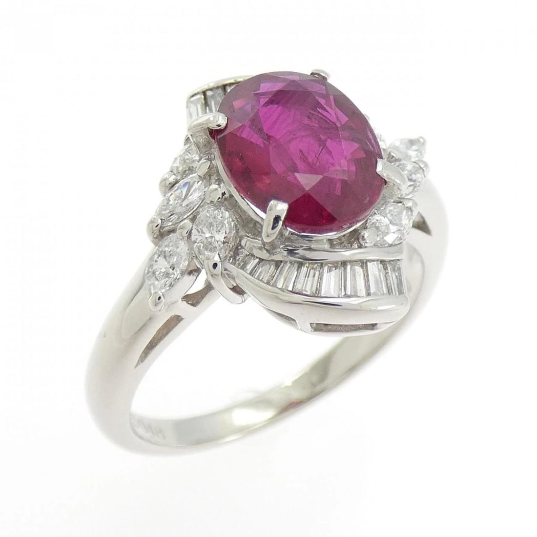 PT900 RUBY RING: PT900 Ruby Ring Brand: Unbranded Type/Style: Ruby Ring Material: Platinum900, Main Stone/Creation RubySecondary Stone Diamond Color: Platinum Size: US 5 3/4 Accessories: None Accessories N