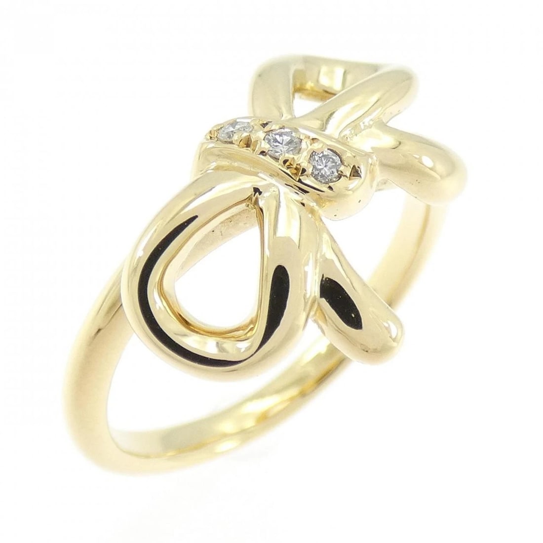K18YG RIBBON DIAMOND RING: K18YG Ribbon Diamond Ring Brand: Unbranded Type/Style: Diamond Ring Material: 18K Yellow Gold, Main Stone/Creation Natural Color: Yellow Gold Size: US 6 1/4 Accessories: None Accessories Notice: When
