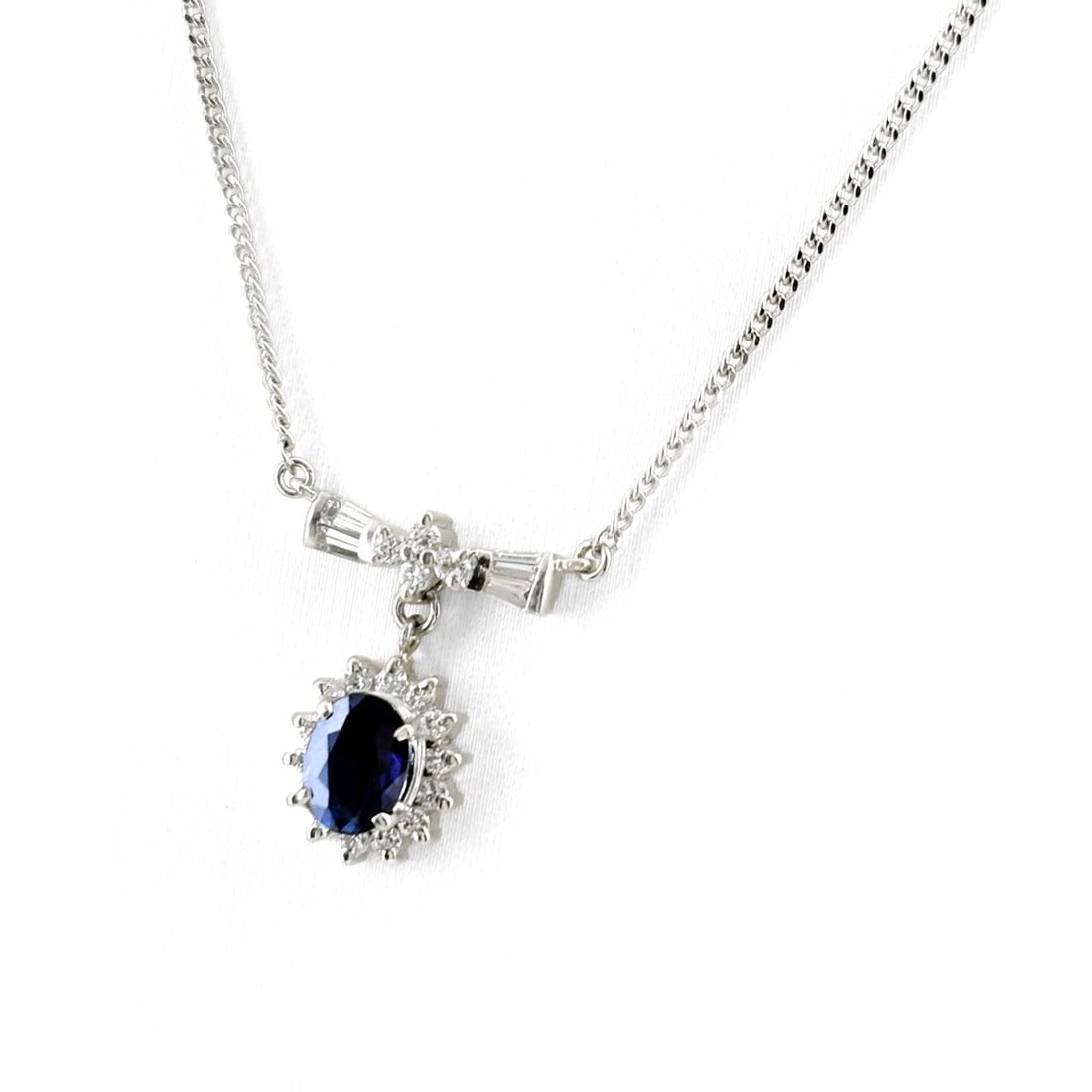 SAPPHIRE DESIGN PLATINUM PENDANT MELEE DIAMOND NECKLACE: Sapphire design Platinum Pendant melee diamond Necklace Brand: Unbranded Type/Style: Necklace Material: Pt900 Pt850, Main Stone/Creation Natural Color: None Size: Chain / code 42cm(16.5") Pendant
