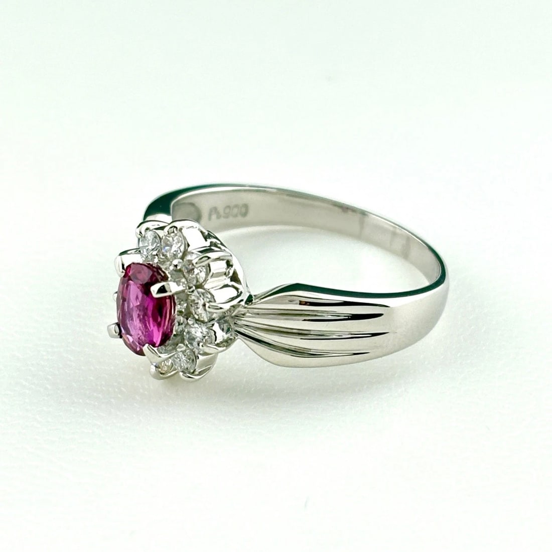 RUBY DESIGN PLATINUM MELEE DIAMOND RING: ruby design Platinum melee diamond Ring Brand: Unbranded Type/Style: Ring Material: Pt900, Main Stone/Creation Ruby Diamond Color: None Size: US 7 to 7.5 Accessories: None Accessories Notice: When