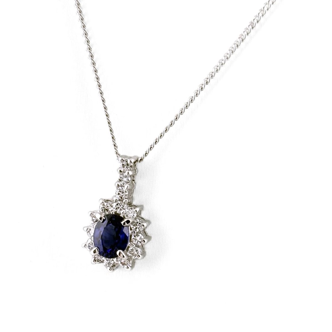 SAPPHIRE DESIGN PLATINUM PENDANT MELEE DIAMOND NECKLACE: Sapphire design Platinum Pendant melee diamond Necklace Brand: Unbranded Type/Style: Necklace Material: Pt900 Pt850, Main Stone/Creation Sapphire Diamond Color: None Size: Chain / code 40.5cm(15.9")