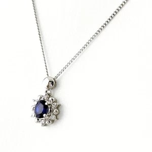 SAPPHIRE DESIGN PLATINUM PENDANT MELEE DIAMOND NECKLACE: Sapphire design Platinum Pendant melee diamond Necklace Brand: Unbranded Type/Style: Necklace Material: Pt900 Pt850, Main Stone/Creation Sapphire Diamond Color: None Size: Chain / code