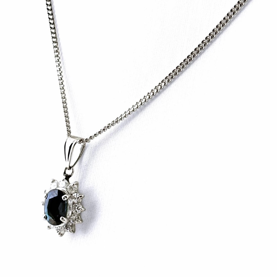 SAPPHIRE DESIGN NECKLACE PLATINUM PENDANT MELEE DIAMOND: Sapphire design necklace Platinum Pendant melee diamond Brand: Unbranded Type/Style: Necklace Material: Pt850, Main Stone/Creation sapphire Color: PT Size: Chain / code 40cm(15.7") Total length of