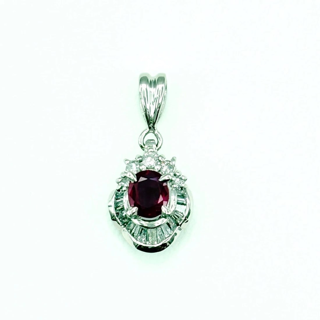 RUBY PENDANT HEAD PLATINUM MELEE DIAMOND: Ruby Pendant Head Platinum melee diamond Brand: Unbranded Type/Style: Pendant Material: Pt900, Main Stone/Creation Ruby Diamond Color: None Size: Chain / code 42cm(16.5") Chain width 0.8mm(0.0")Total