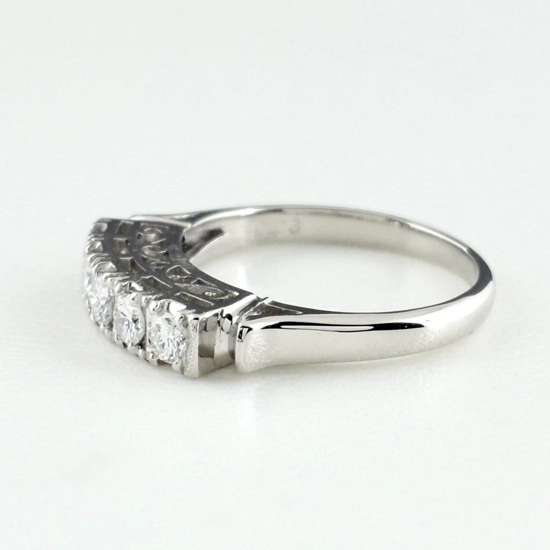 MELEE DIAMOND DESIGN PLATINUM RING - 3