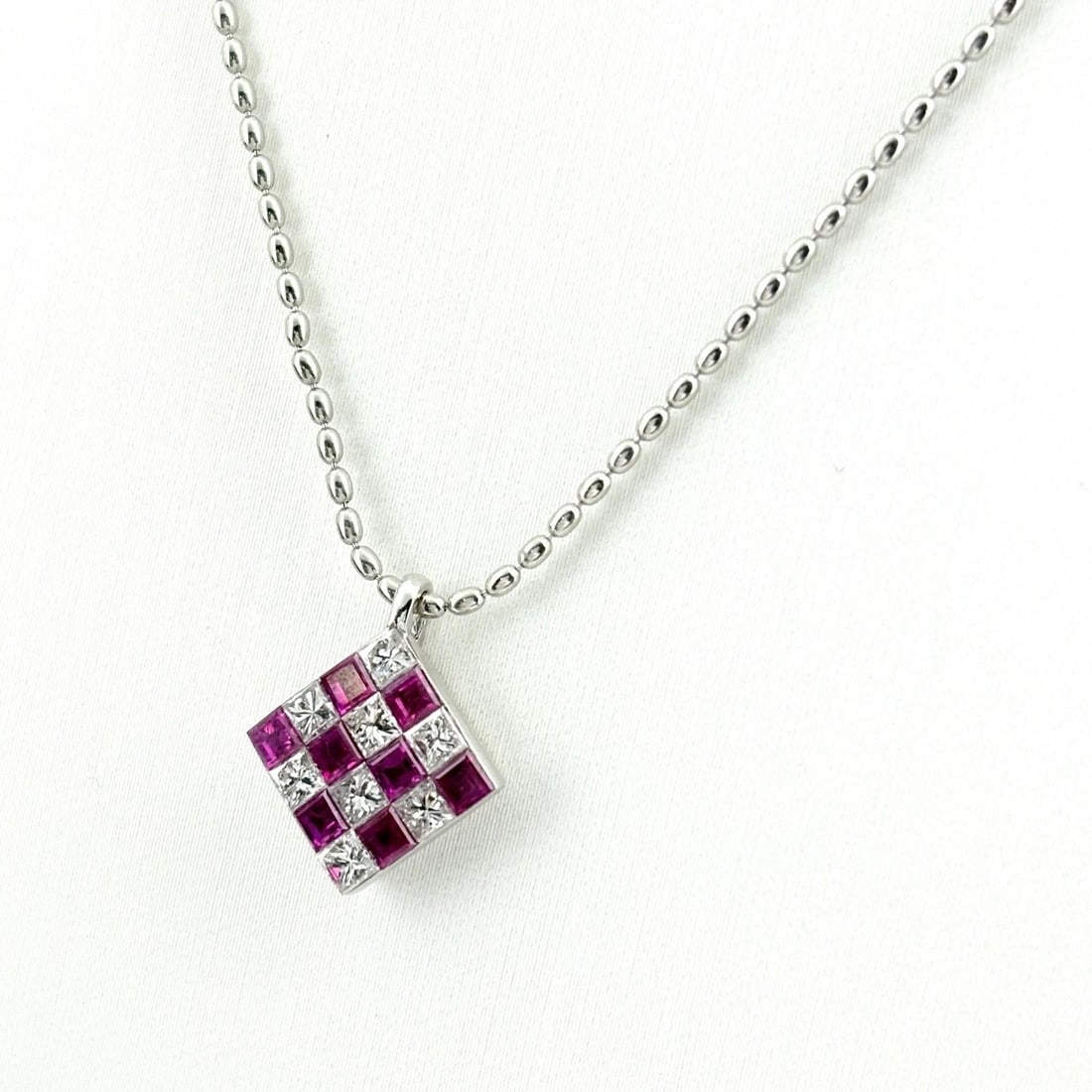 RUBY DESIGN PLATINUM PENDANT MELEE DIAMOND NECKLACE: Ruby Design Platinum Pendant melee diamond Necklace Brand: Unbranded Type/Style: Necklace Material: Pt900 Pt850, Main Stone/Creation Ruby Diamond Color: None Size: Chain width 1.1mm(0.0") Pendant size
