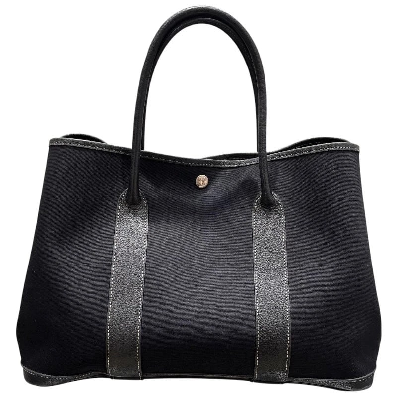 HERMES GARDEN PARTY PM BLACK TOILE BUFFALO: HERMES Garden Party PM Black Toile Buffalo Brand: HERMES Type/Style: Handbag Material: Toile Buffle Color: black Size: W: 37cm / H: 26cm / D: 16cm Accessories: None Accessories Notice: When