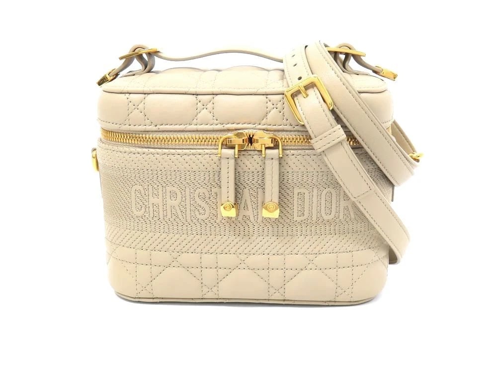 CHRISTIAN DIOR LAMBSKIN BEIGE SMALL VANITY: Christian Dior Lambskin Beige Small Vanity Brand: CHRISTIAN DIOR Type/Style: Handbag Material: Lambskin Beige Color: Beige Size: D 18 ? H 14 ? G 10cm Accessories: None Accessories Notice: When