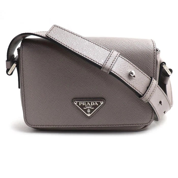 PRADA SAFFIANO TRIANGLE LOGO SHOULDER BAG: PRADA Saffiano Triangle Logo Shoulder Bag Brand: PRADA Type/Style: Handbag Material: Leather Color: Gray Size: W21cm x H14cm x D5.5cm Accessories: None Accessories Notice: When purchasing pre-owned