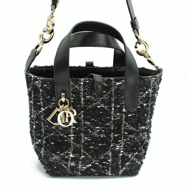 CHRISTIAN DIOR TOJOURS VERTICAL NANO TOTE BAG CANNAGE BLACK: Christian Dior Tojours Vertical Nano Tote Bag Cannage Black Brand: Christian Dior Type/Style: Handbag Material: Cannage Tweed Color: Black Size: W: 20.5-12.5cm ? H: 15cm ? D: 12cm Accessories: Non