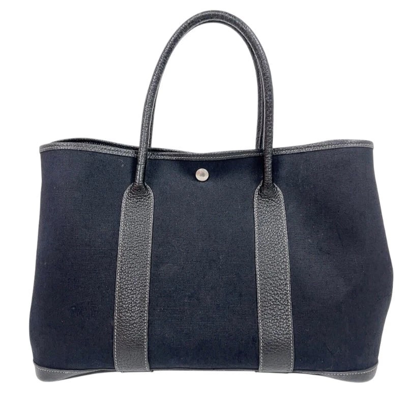 HERMES GARDEN PARTY PM BLACK SHW TOILE BUFFALO: HERMES Garden Party PM Black SHW Toile Buffalo Brand: HERMES Type/Style: Handbag Material: Toile Buffle Color: Black / SV Hardware Size: W: 36cm / H: 24.5cm / D: 17cm Accessories: None Acc