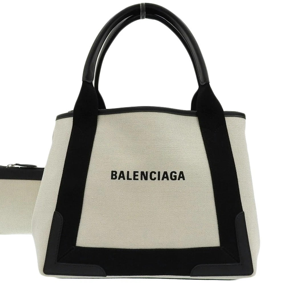 BALENCIAGA NAVY CABAS TOTE BAG CANVAS ? LEATHER: BALENCIAGA Navy Cabas Tote Bag Canvas ? Leather Brand: Balenciaga Type/Style: Tote Bag Material: Canvas X Leather Color: Black Size: W: 30cm (bottom) / H: 24cm / D: 17cm Accessories: None Accessories