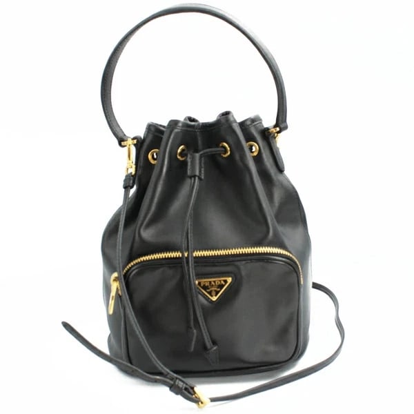 PRADA DUETTO BUCKET BAG CALF/SAFFIANO BLACK: Prada Duetto Bucket Bag Calf/Saffiano Black Brand: Prada Type/Style: Handbag Material: Calfskin/Saffiano Color: Black Size: W:25cm ? H:22cm ? D:11.5cm Accessories: None Accessories Notice: When