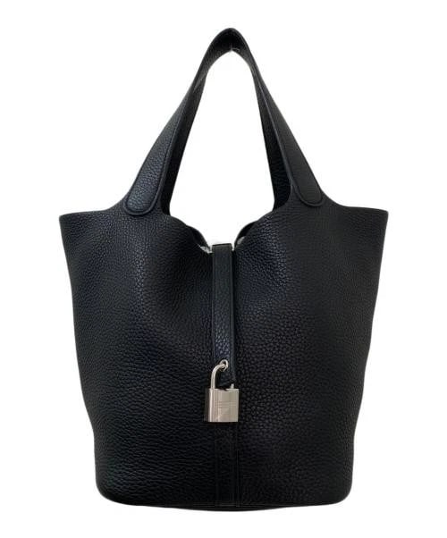 HERMES PICOTIN LOCK MM: HERMES Picotin Lock MM Brand: HERMES Type/Style: Handbag Material: Taurillon Clemence Color: Black With Silver Hardware Size: H:21cm / W:17cm / D:21cm Accessories: None Accessories Notice: When