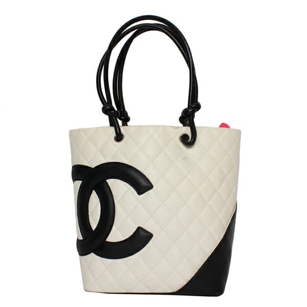 CHANEL LINE MEDIUM TOTE CAMBON WHITE/BLACK TOTE BAG: Chanel Line Medium Tote Cambon White/Black Tote Bag Brand: Chanel Type/Style: Handbag Material: Lambskin Color: White Size: W:27cm ? H:24cm ? D:12cm Accessories: None Accessories Notice: When