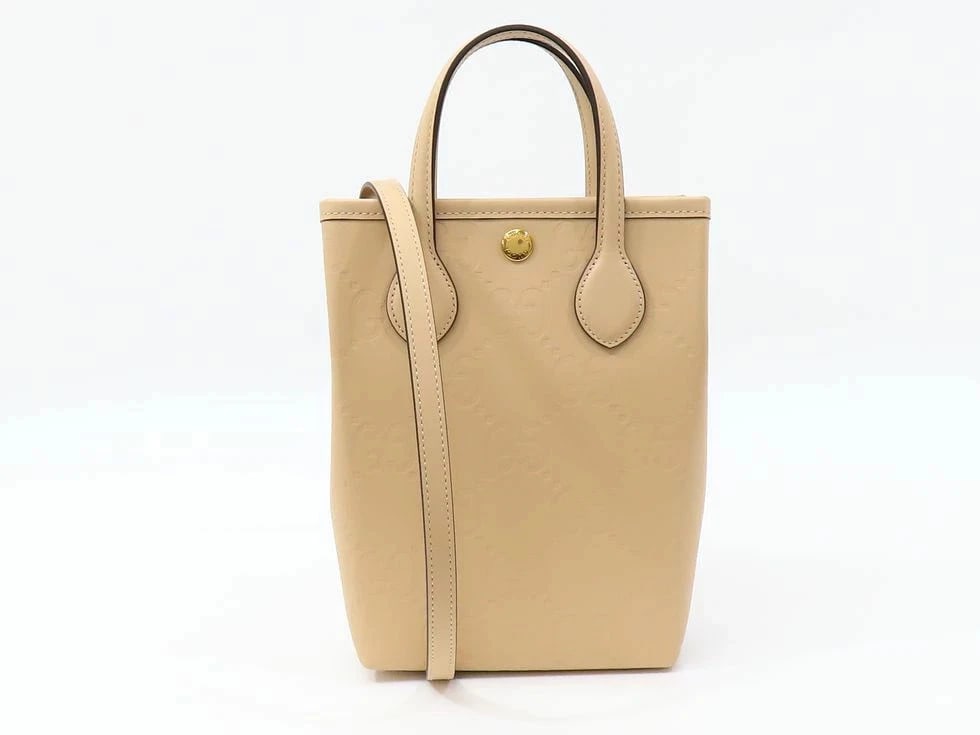 GUCCI GG LEATHER BEIGE GG SUPER MINI BAG: Gucci GG Leather Beige GG Super Mini Bag Brand: GUCCI Type/Style: Handbag Material: GG Leather Beige Color: Beige Size: D 14 ? H 21 ? G 5cm Accessories: None Accessories Notice: When purchasing