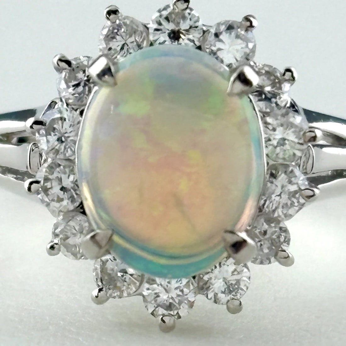 OPAL DESIGN PLATINUM MELEE DIAMOND RING: opal design Platinum melee diamond Ring Brand: Unbranded Type/Style: Ring Material: Pt850, Main Stone/Creation opal?diamond Color: None Size: US 6) Accessories: None Accessories Notice: When