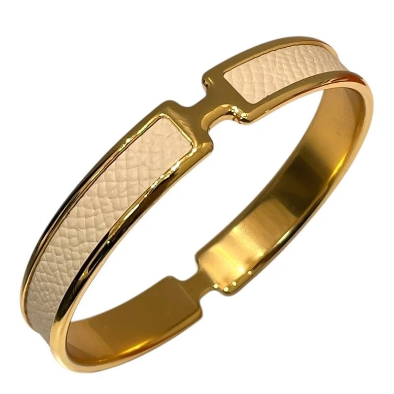 HERMES BRACELET WHITE GOLD EPSON METAL: Hermes Bracelet White Gold Epson Metal Brand: Hermes Type/Style: Bracelet Material: Epson Metal, Color: White, Gold Size: Approximately 7.5 inches wrist circumference Accessories: None Acc