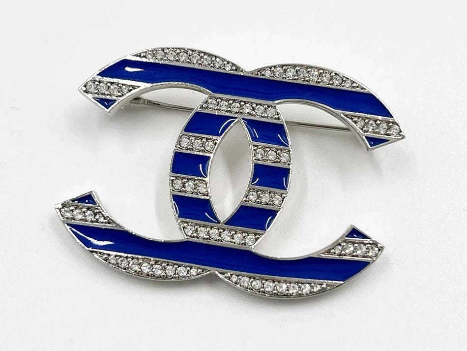 CHANEL BROOCH BLUE RHINESTONES SILVER: CHANEL Brooch Blue Rhinestones Silver Brand: Chanel Type/Style: Brooch Material: Silver, Rhinestones, Color: Silver, Blue Size: W2 in x H1.4 in Accessories: None Accessories Notice: When purchasing