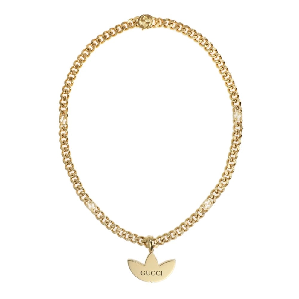 GUCCI NECKLACE GOLD & BLACK CHAIN: Gucci Necklace Gold & Black Chain Brand: Gucci Type/Style: Necklace Material: GP (Gold Plated), Color: Gold & Black Size: Length: 50cm (19.7 inches), Charm: 2.5cm x 3.8cm (0.98 x 1.5) Accessories: