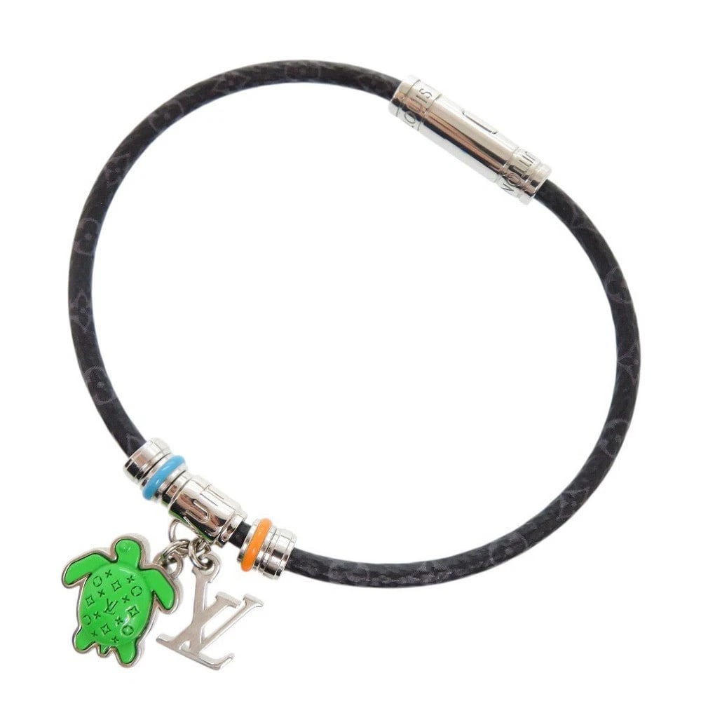 LOUIS VUITTON MONOGRAM ECLIPSE BRACELET: Louis Vuitton Monogram Eclipse Bracelet Brand: Louis Vuitton Type/Style: Bracelet Material: Monogram Eclipse leather, Color: Black Size: Length 8.9 in, Width 0.1 in, Wrist 7.9 in Accessories: None