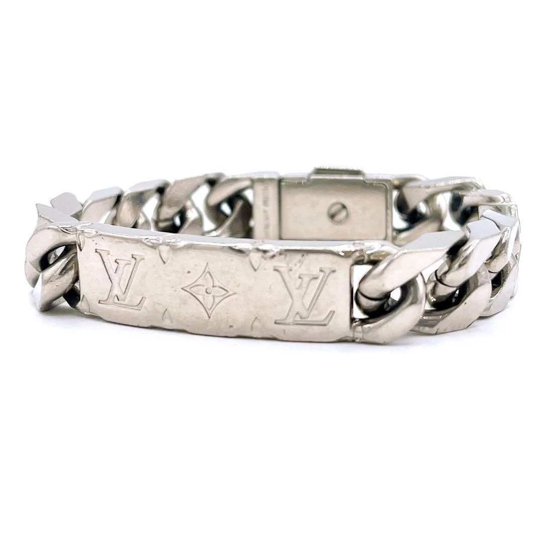 LOUIS VUITTON MONOGRAM CHAIN BRACELET: Louis Vuitton Monogram Chain Bracelet Brand: Louis Vuitton Type/Style: Bracelet Material: Metal, Color: SILVER Size: Length approximately 7.7-7.9 inches, Band width 0.4 inches Accessories: None