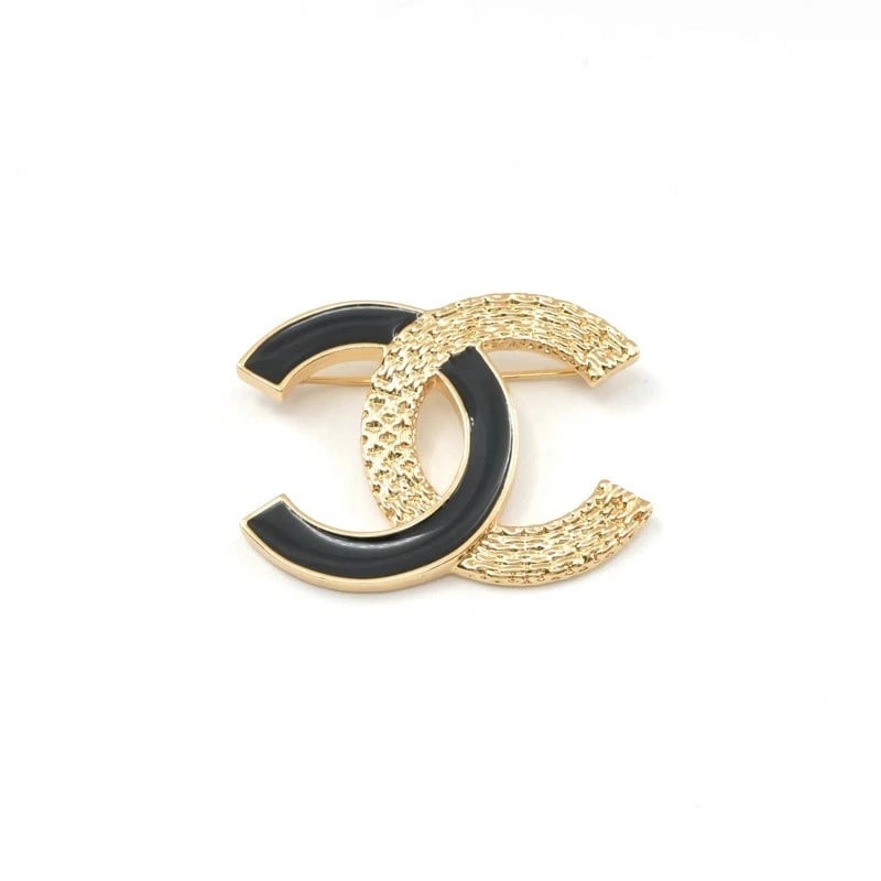 CHANEL GOLD & BLACK BROOCH CORSAGE: CHANEL Gold & Black Brooch Corsage Brand: Chanel Type/Style: Brooch Material: GP (Gold-Plated), Color: Gold,Black Size: 1.97 in (W) x 1.50 in (H) Accessories: None Accessories Notice: When purchasing