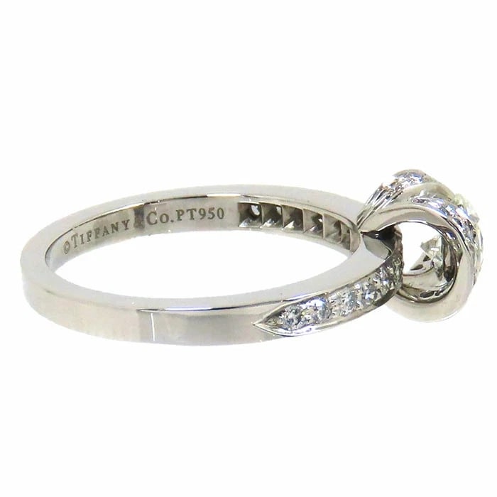 TIFFANY RIBBON DIAMOND RING PT950: Tiffany Ribbon Diamond Ring PT950 Brand: Tiffany & Co. Type/Style: Ring Material: PT950 PLATINUM, Main Stone/Creation NATURAL Color: SILVER Size: US6 Accessories: None Accessories Notice: When