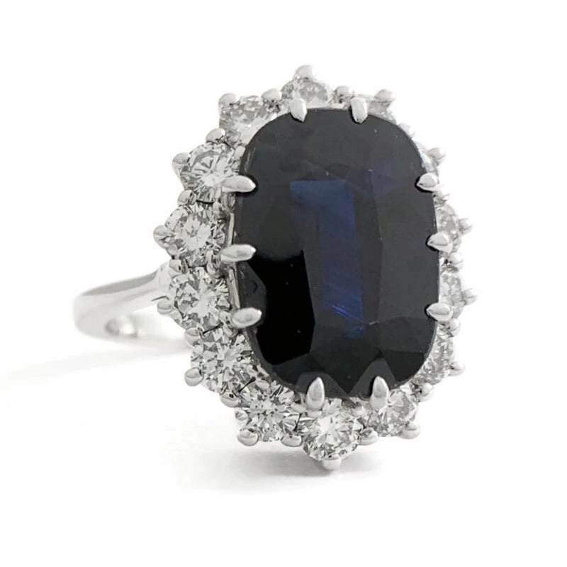 OVAL BLACK SAPPHIRE DIAMOND HALO RING 14K WHITE GOLD: Oval Black Sapphire Diamond Halo Ring 14K White Gold Brand: Halo Type/Style: Ring Material: 14K White Gold, Main Stone/Creation Natural Color: Blue Size: 6.75 US Accessories: None Accessor