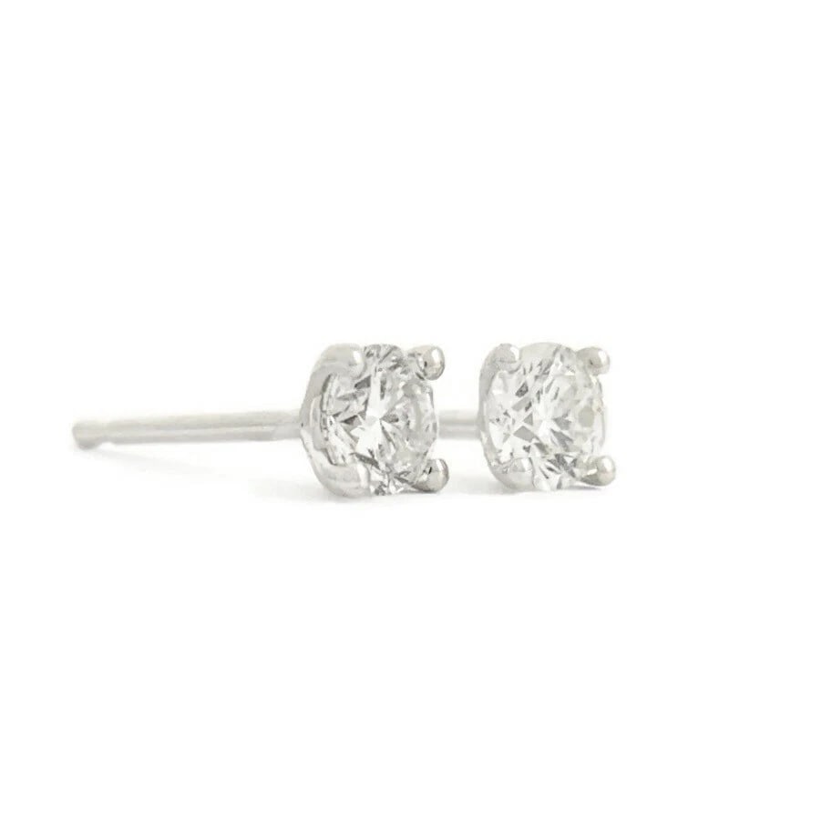 ROUND DIAMOND STUD EARRINGS 14K WHITE GOLD: Round Diamond Stud Earrings 14K White Gold Brand: none Type/Style: Earrings Material: 14K White Gold, Main Stone/Creation Natural Color: White Size: Measurements: 3.3 mm Accessories: None Accessories