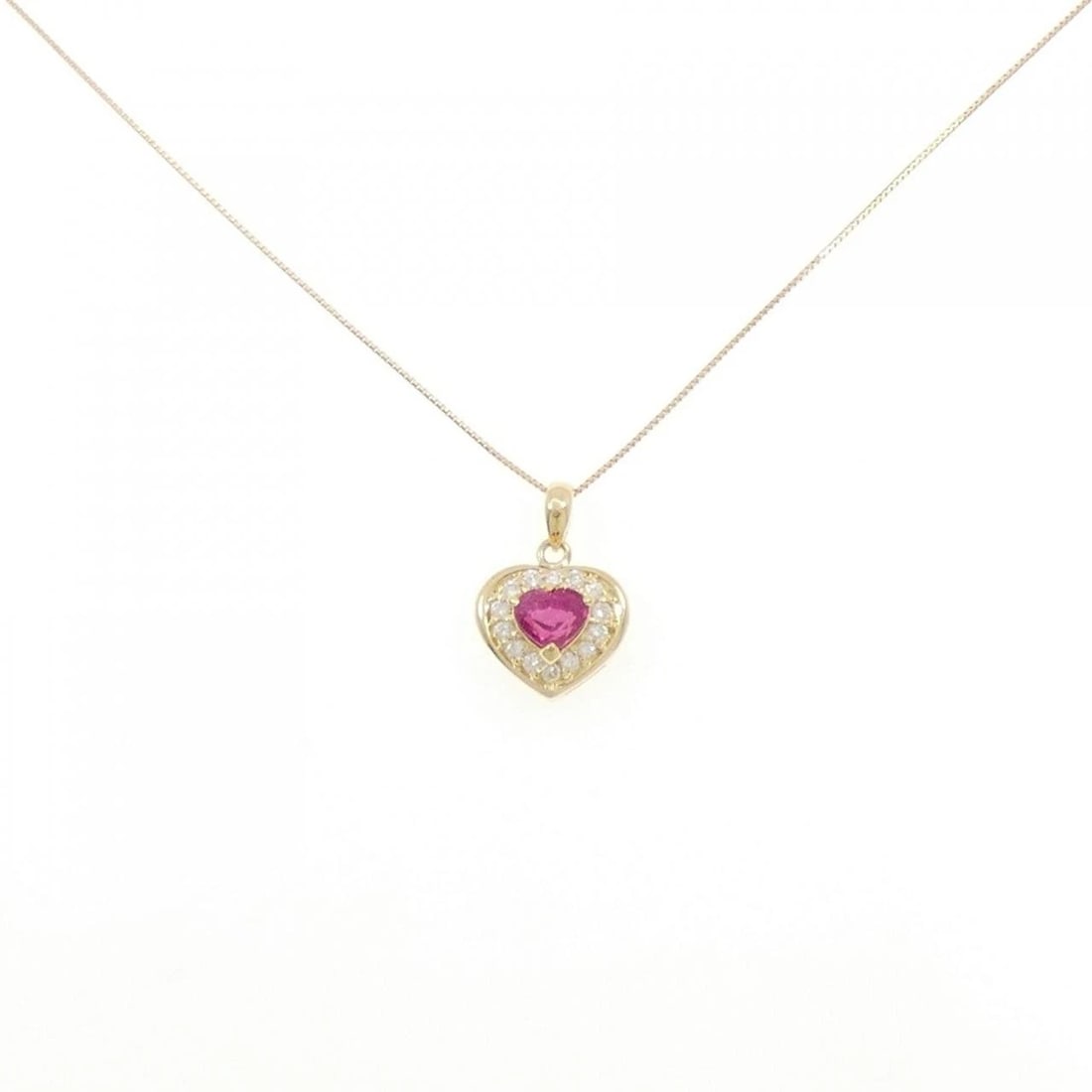 K18YG HEART RUBY NECKLACE: K18YG Heart Ruby Necklace Brand: Unbranded Type/Style: Ruby Necklace Material: K18 yellow gold, Main Stone/Creation RubySecondary Stone Diamond Color: Yellow Gold Size: 40cmActual Size Pendant length 