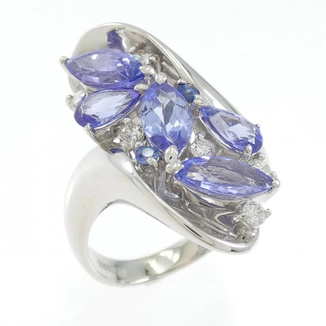 PT900 COLOR STONE RING: PT900 color stone ring Brand: Unbranded Type/Style: Tanzanite Ring Material: Platinum900, Main Stone/Creation TanzaniteSecondary Stone Diamond /Sapphire Color: Silver Size: US 6 1/2 Accessories: None