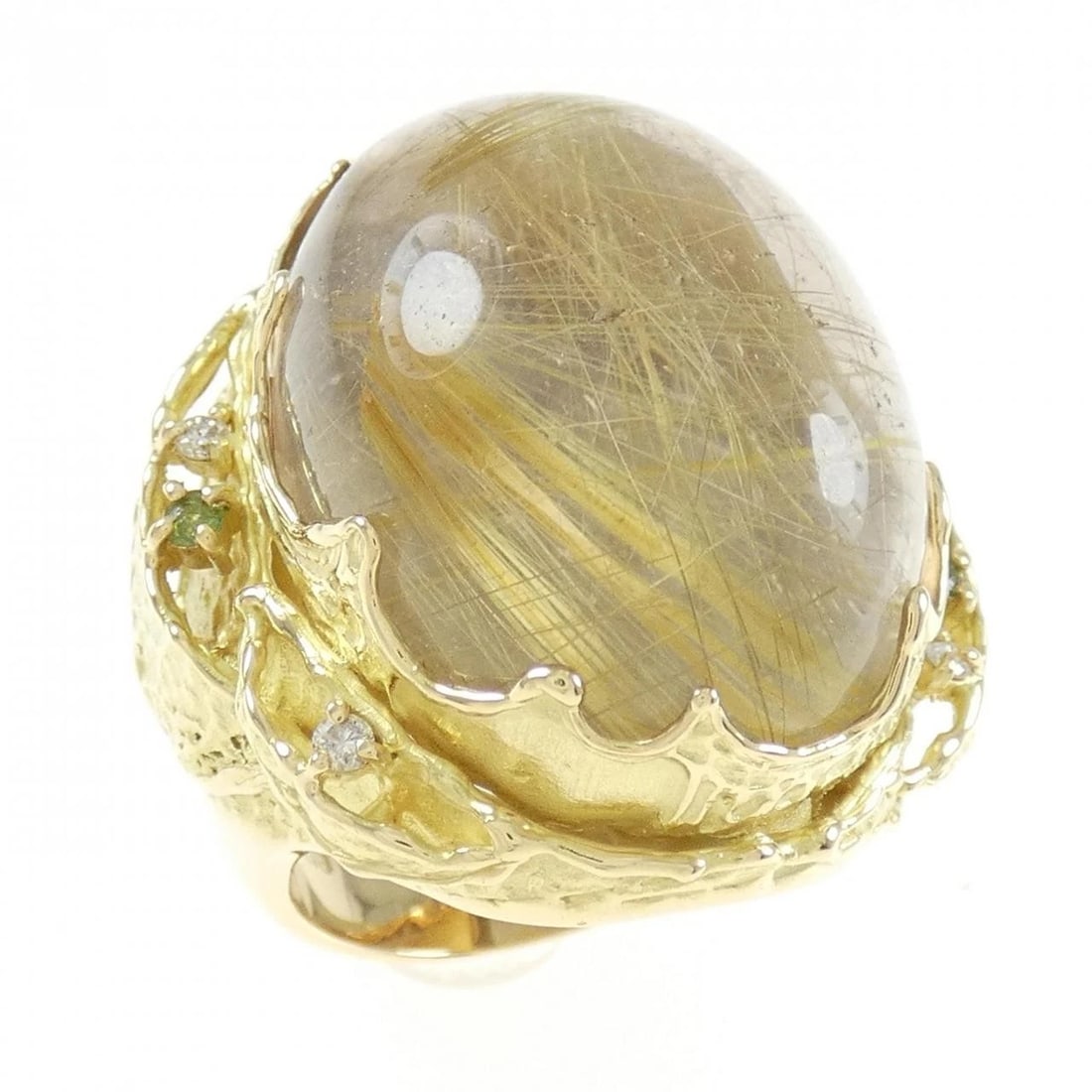 K18YG RUTILE QUARTZ RING: K18YG Rutile Quartz Ring Brand: Unbranded Type/Style: Rutile Quartz Ring Material: K18 yellow gold, Main Stone/Creation Rutile Quartz Secondary Stone Garnet / Diamond Color: Yellow Gold Size: US 7