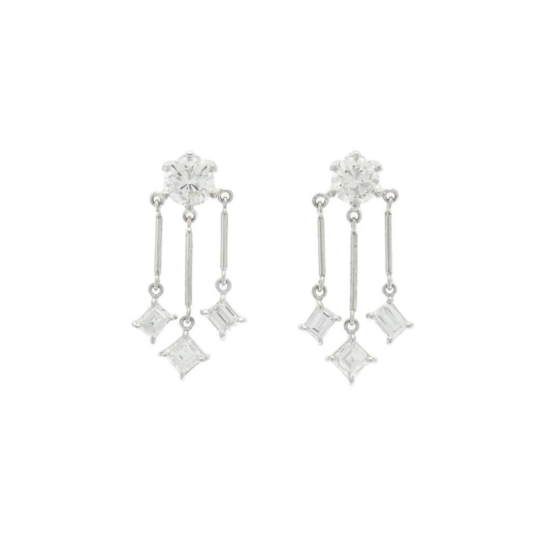 PT900 DIAMOND PIERCE: PT900 Diamond Pierce Brand: Unbranded Type/Style: Diamond Pierce/Earring Material: PT900, Main Stone/Creation Natural Color: Silver Size: Actual Size Approx. height x width: 21.7mm x 10.5mm