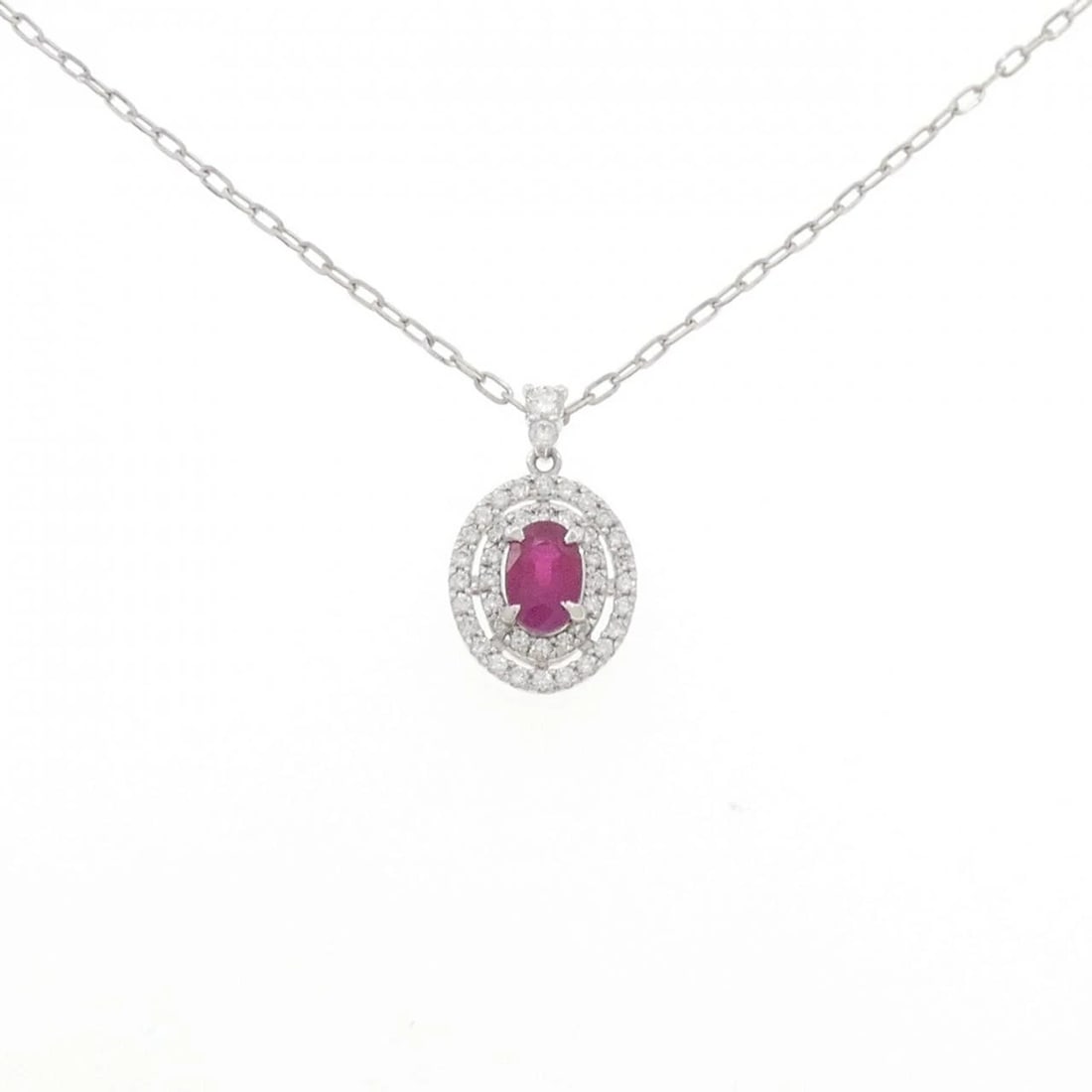 PT900/PT850 RUBY NECKLACE: PT900/PT850 Ruby Necklace Brand: Unbranded Type/Style: Ruby Necklace Material: PT900/PT850, Main Stone/Creation RubySecondary Stone Diamond Color: silver Size: 46cmActual Size Pendant length approx.