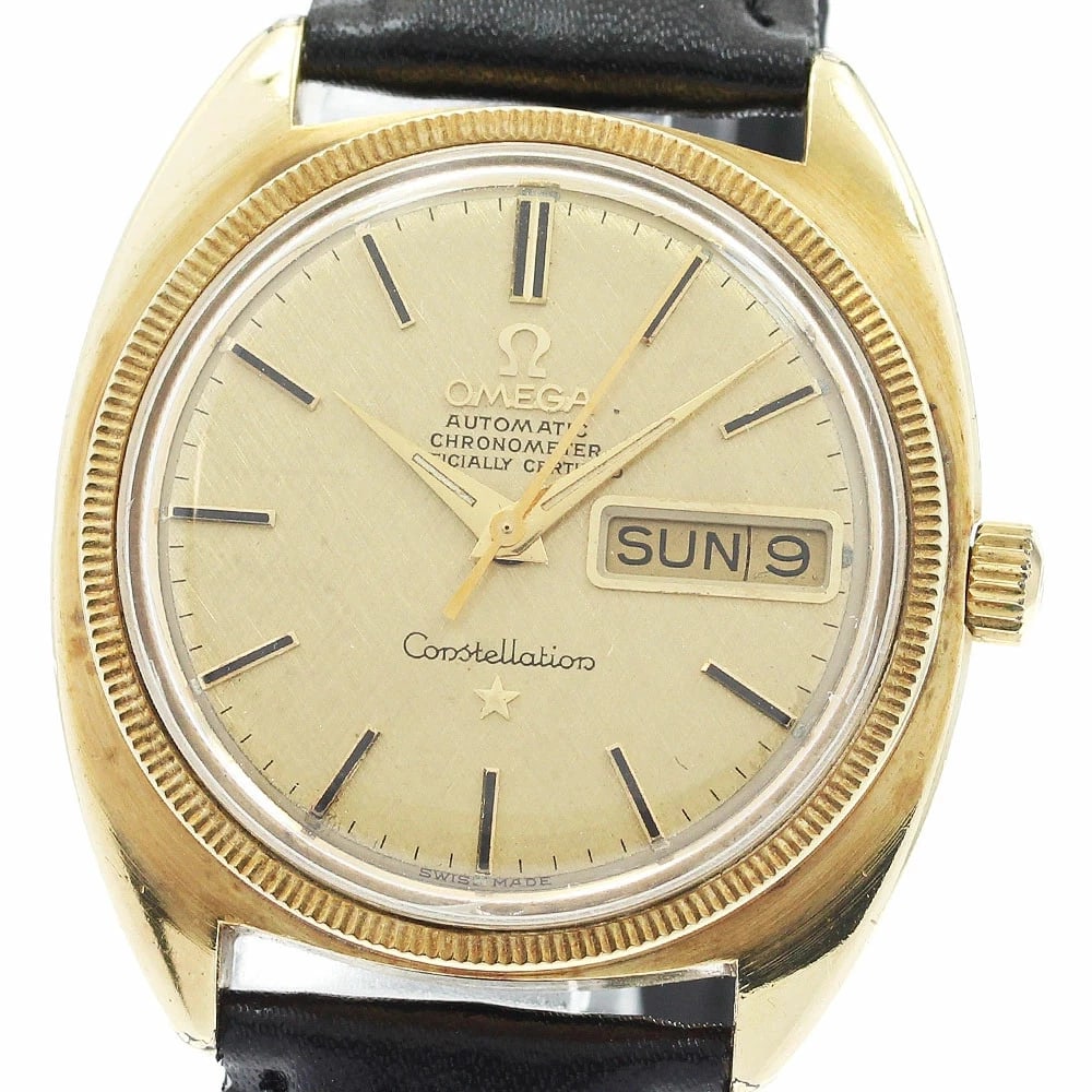 OMEGA CONSTELLATION DAY DATE AUTOMATIC WATCH: Omega Constellation Day Date Automatic Watch Brand: Omega Type/Style: Wristwatch Material: Case Material: Stainless Steel / Gold Plating / Gold Band Material: Leather Color: Dial Color gold Size: Case