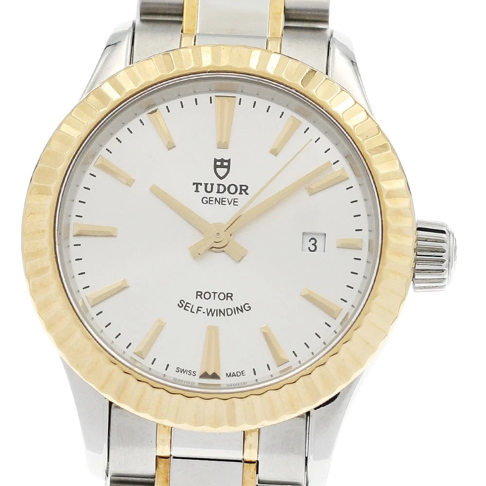 TUDOR DATE SILVER AUTOMATIC WATCH: TUDOR Date Silver Automatic Watch Brand: TUDOR Type/Style: Wristwatch Material: Band Material Stainless Steel/YG, Case Material Stainless Steel/YG Color: Band Color Silver / Gold, Dial Color Silver,