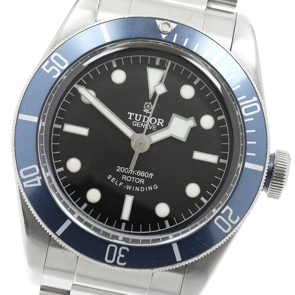 TUDOR HERITAGE BLACK AUTOMATIC WATCH: TUDOR Heritage Black Automatic Watch Brand: TUDOR Type/Style: Wristwatch Material: Band Material Stainless Steel, Case Material Stainless Steel Color: Band Color Silver, Dial Color black, Case Color S
