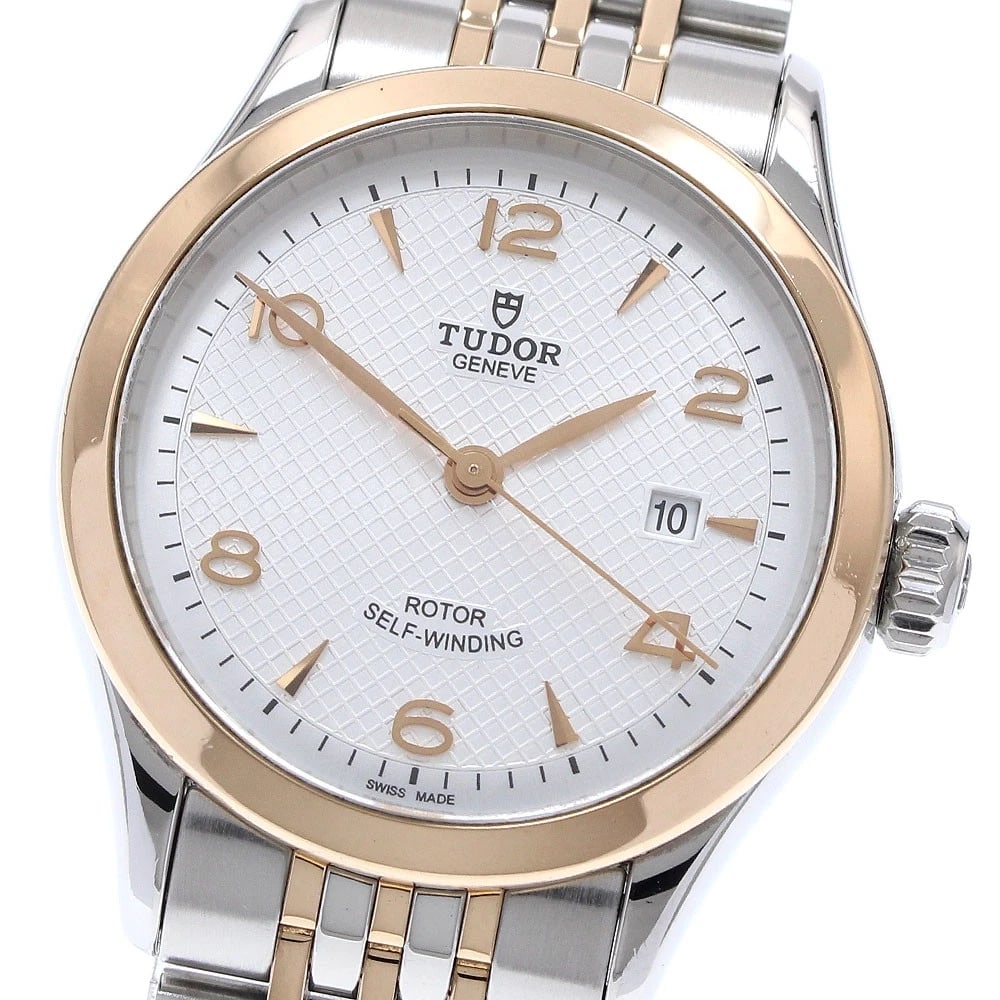 TUDOR DATE SILVER AUTOMATIC WATCH: TUDOR Date Silver Automatic Watch Brand: TUDOR Type/Style: Wristwatch Material: Band Material Stainless Steel/PG, Case Material Stainless Steel/PG Color: Band Color Silver / Pink Gold, Dial Color Silv