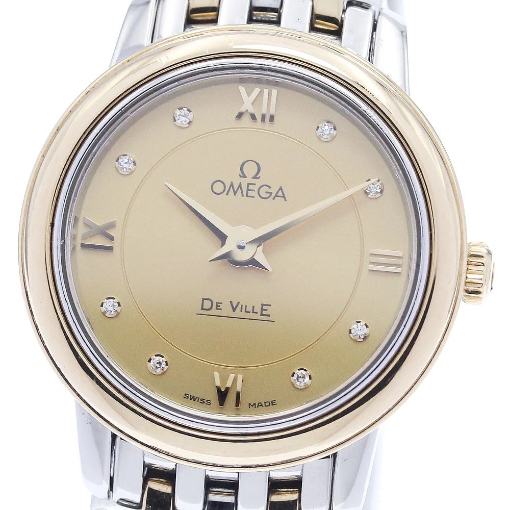 OMEGA DE VILLE PRESTIGE LADIES WATCH: OMEGA De Ville Prestige Ladies Watch Brand: OMEGA Type/Style: Wristwatch Material: Band Material Stainless Steel/YG, Case Material Stainless Steel/YG Color: Band Color Silver / Gold, Dial Color gold,