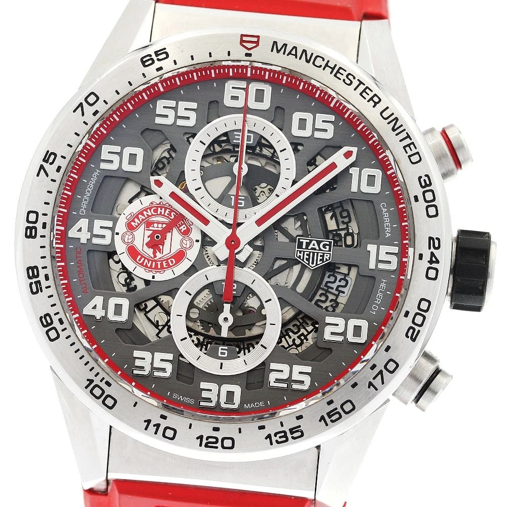 TAG HEUER CARRERA HEUER MANCHESTER UNITED MEN'S WATCH: TAG HEUER Carrera Heuer Manchester United Men's Watch Brand: TAG HEUER Type/Style: Wristwatch Material: Band Material rubber, Case Material Stainless Steel Color: Band Color Red, Dial Color Silver,