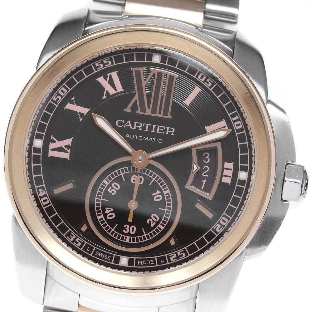 CARTIER CALIBRE DE CARTIER AUTOMATIC MEN'S WATCH: CARTIER Calibre de Cartier Automatic Men's Watch Brand: CARTIER Type/Style: Wristwatch Material: Band Material Stainless Steel/PG, Case Material Stainless Steel/PG Color: Band Color Silver / Pink