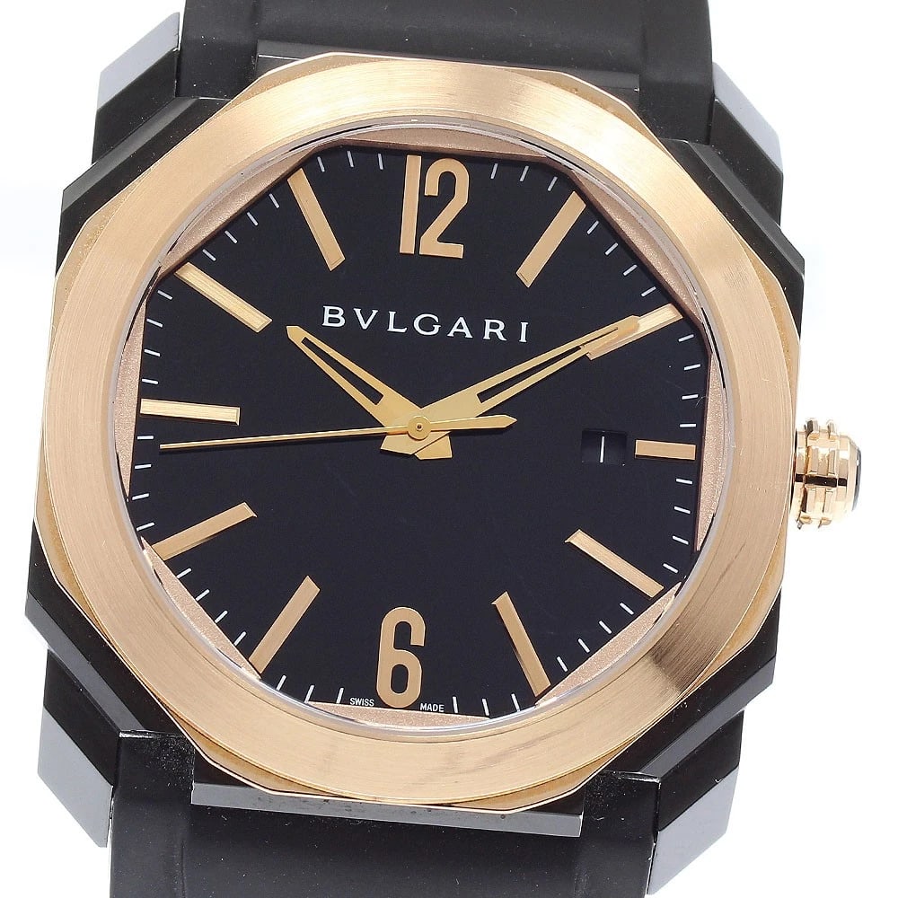 BVLGARI OCTO DATE MEN'S WATCH: BVLGARI Octo Date Men's Watch Brand: BVLGARI Type/Style: Wristwatch Material: Band Material rubber, Case Material Stainless Steel/K18PG Color: Band Color black, Dial Color black, Case Color Black /