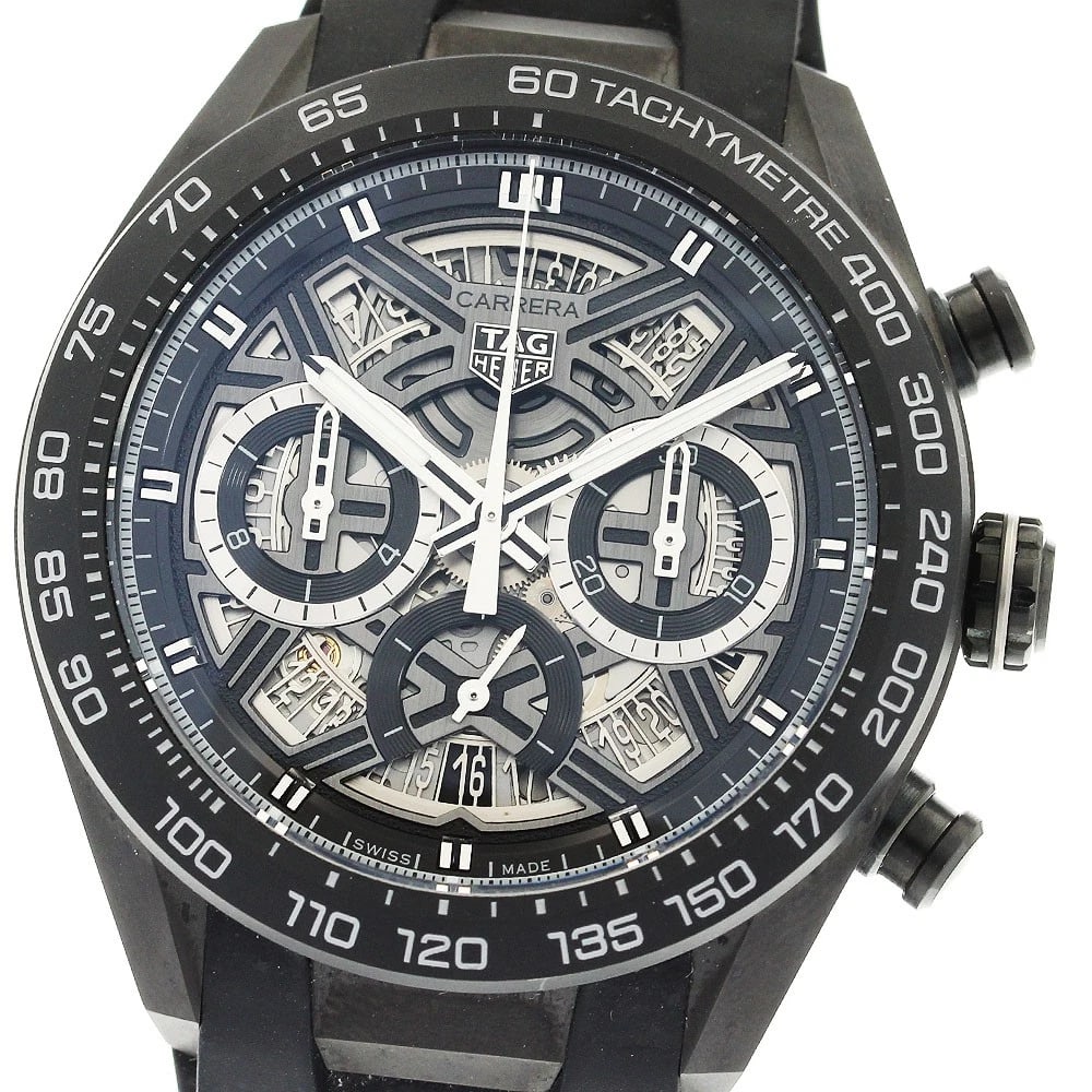 TAG HEUER CARRERA CHRONOGRAPH SKELETON WATCH: TAG HEUER Carrera Chronograph skeleton Watch Brand: TAG HEUER Type/Style: Wristwatch Material: Band Material rubber, Case Material titanium Color: Band Color black, Dial Color skeleton, Case Color Sil